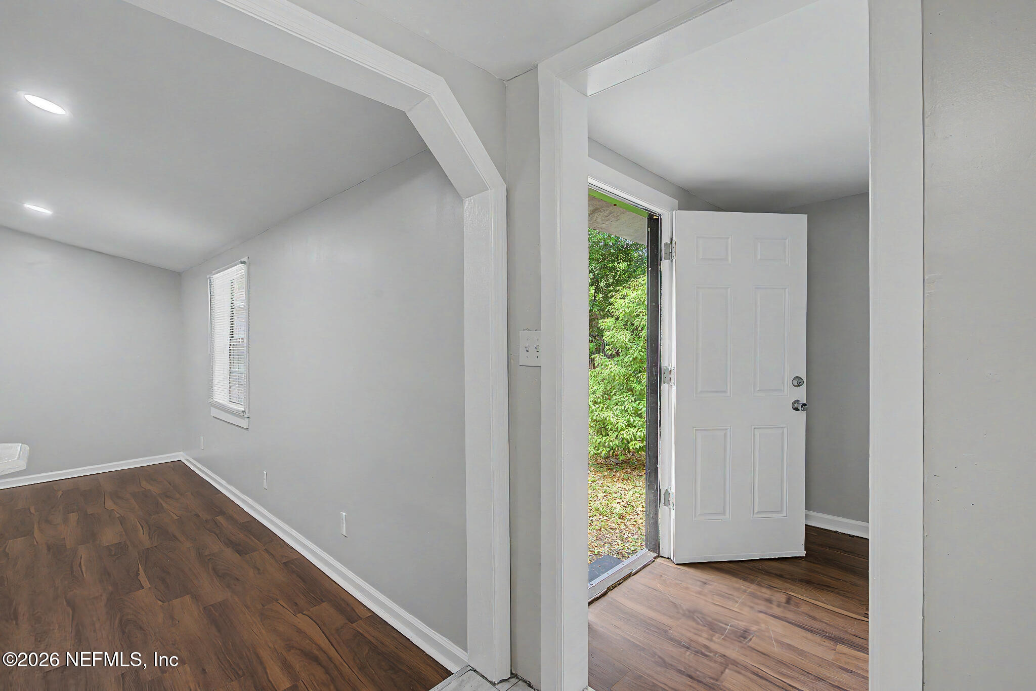 2625 Kohn Road Jacksonville, FL 32210 - Photo 11 of 34 a view of hallway with window and wooden floor