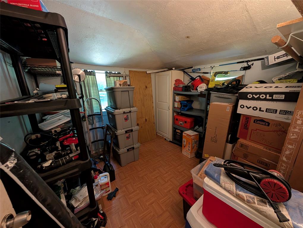 308 Short Street Mansfield, TX 76063 - Photo 16 of 21 a view of walk in closet with clothes and shoes