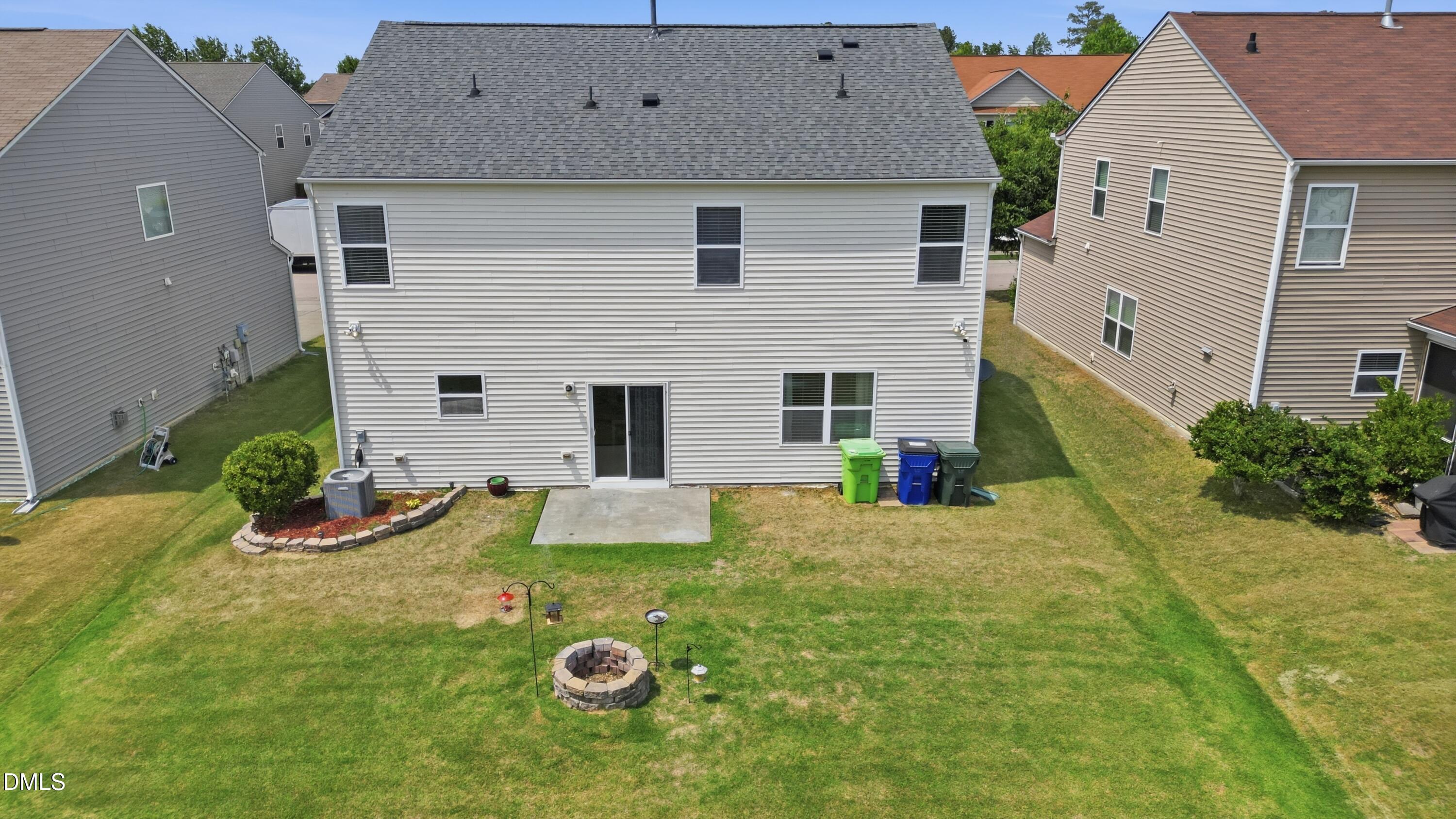 8128 Hovingham Way Raleigh, NC 27616 - Photo 31 of 40 a view of a house with a yard