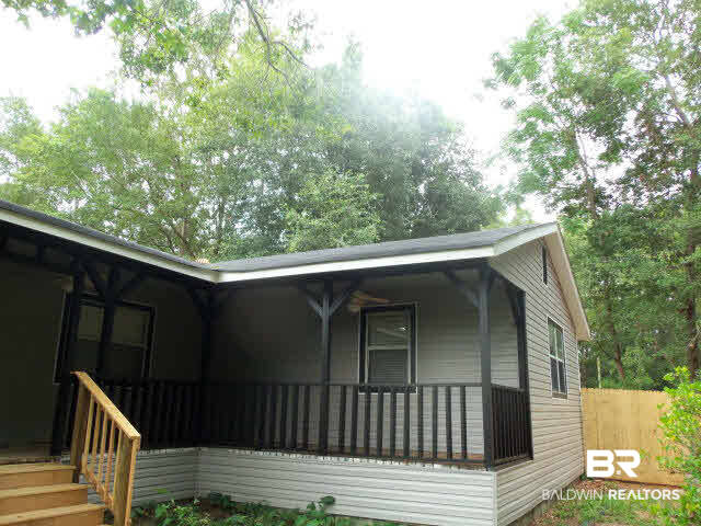 18568 South Greeno Road Fairhope, AL 36532 - Photo 20 of 22 COVERED FRONT PORCH.