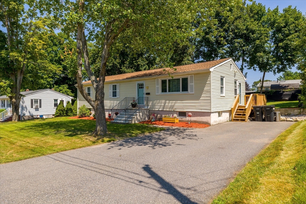 14 Grosvenor Street Ayer, MA 01432 - Photo 2 of 30 a view of house and outdoor space