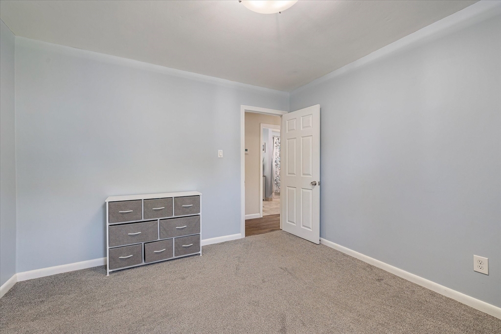 14 Grosvenor Street Ayer, MA 01432 - Photo 22 of 30 a view of an empty room and cabinet
