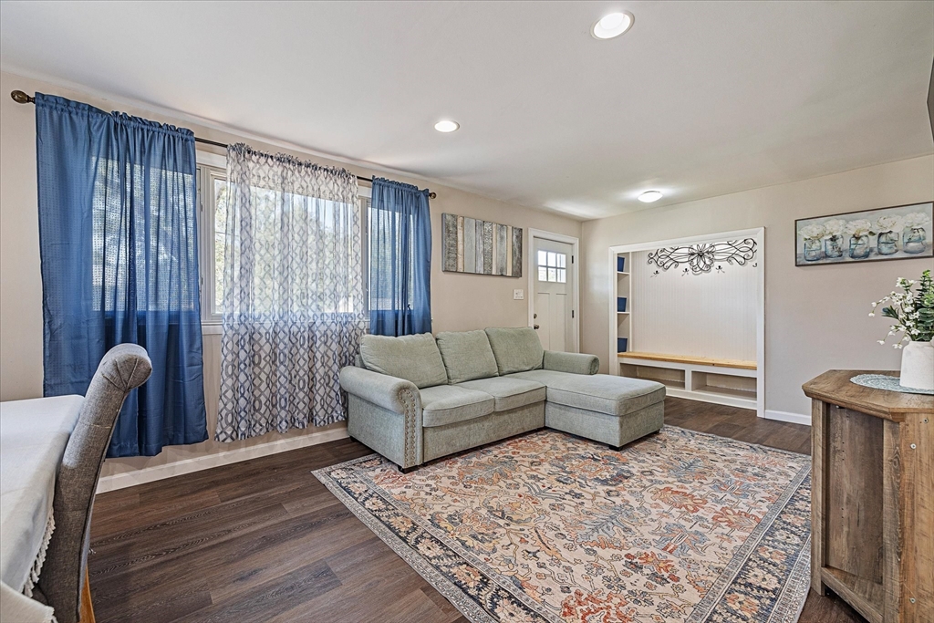 14 Grosvenor Street Ayer, MA 01432 - Photo 4 of 30 a living room with furniture and a rug