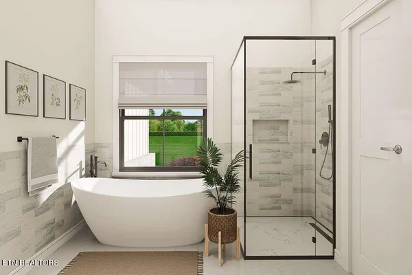 a bathroom with a bathtub and shower