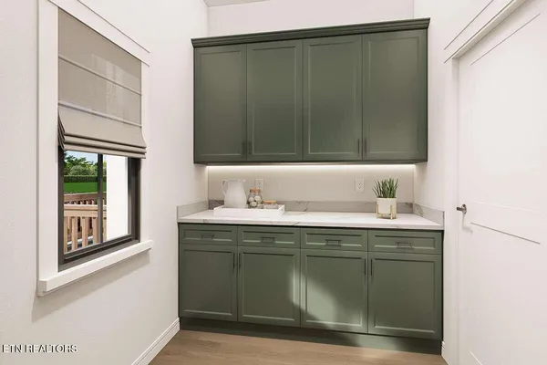 a bathroom with a sink and mirror