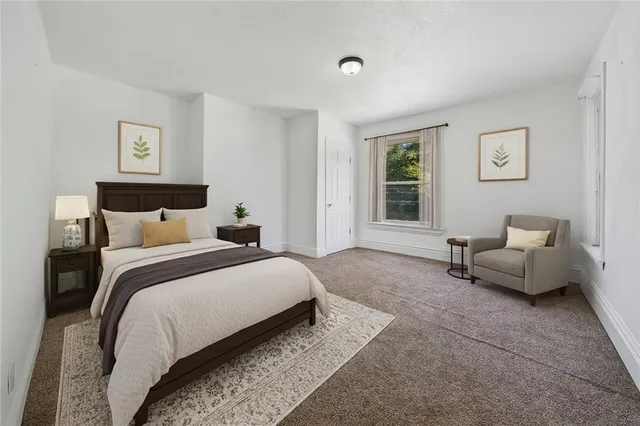 a bed room with a bed and a couch