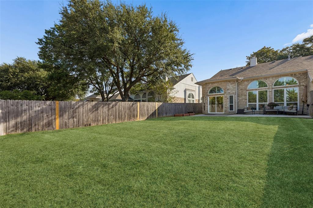5709 Highgate Lane Rowlett, TX 75088 - Photo 23 of 27 grass has been virtually enhanced