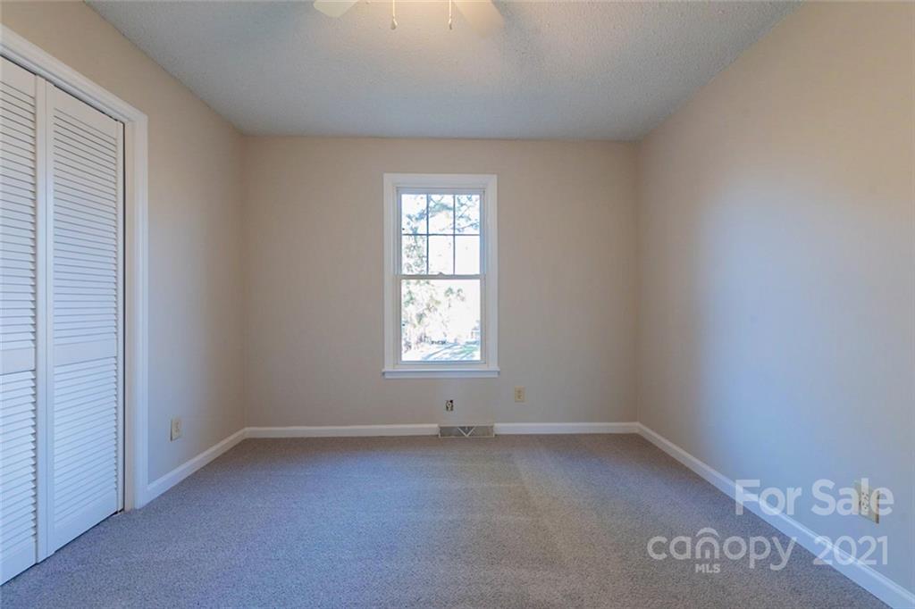 1593 Brook Drive Fort Mill, SC 29708 - Photo 13 of 18 an empty room with a window