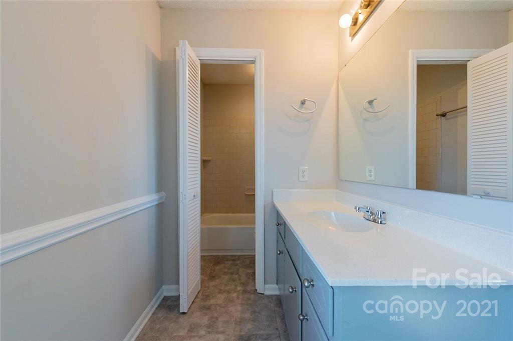 1593 Brook Drive Fort Mill, SC 29708 - Photo 6 of 18 a bathroom with a sink and a mirror