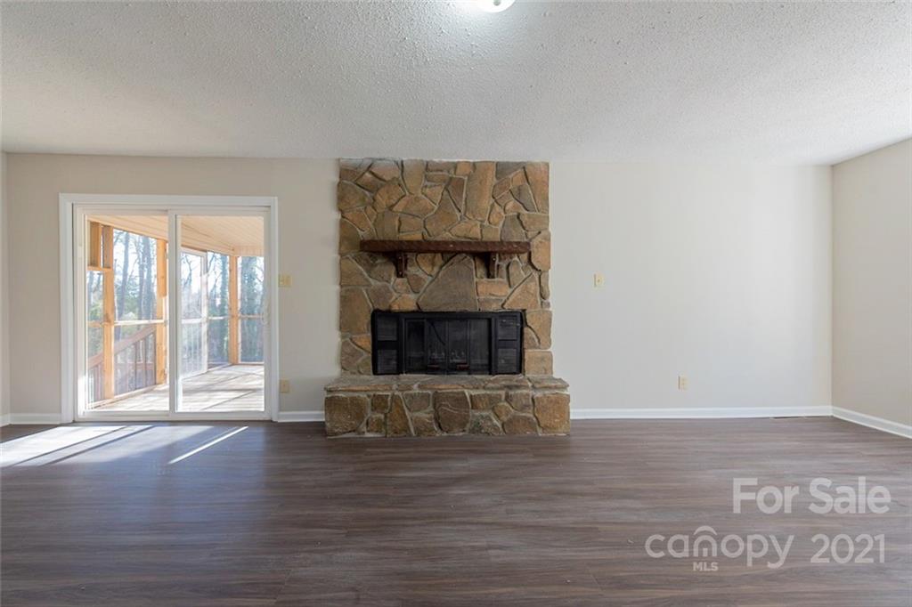 1593 Brook Drive Fort Mill, SC 29708 - Photo 10 of 18 a living room with a fireplace