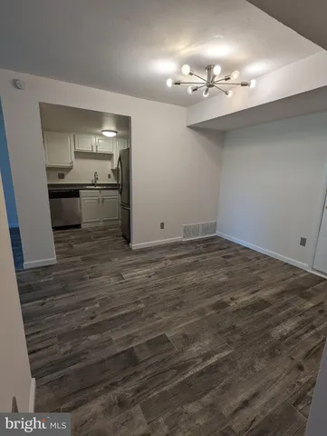 a view of a kitchen with a sink