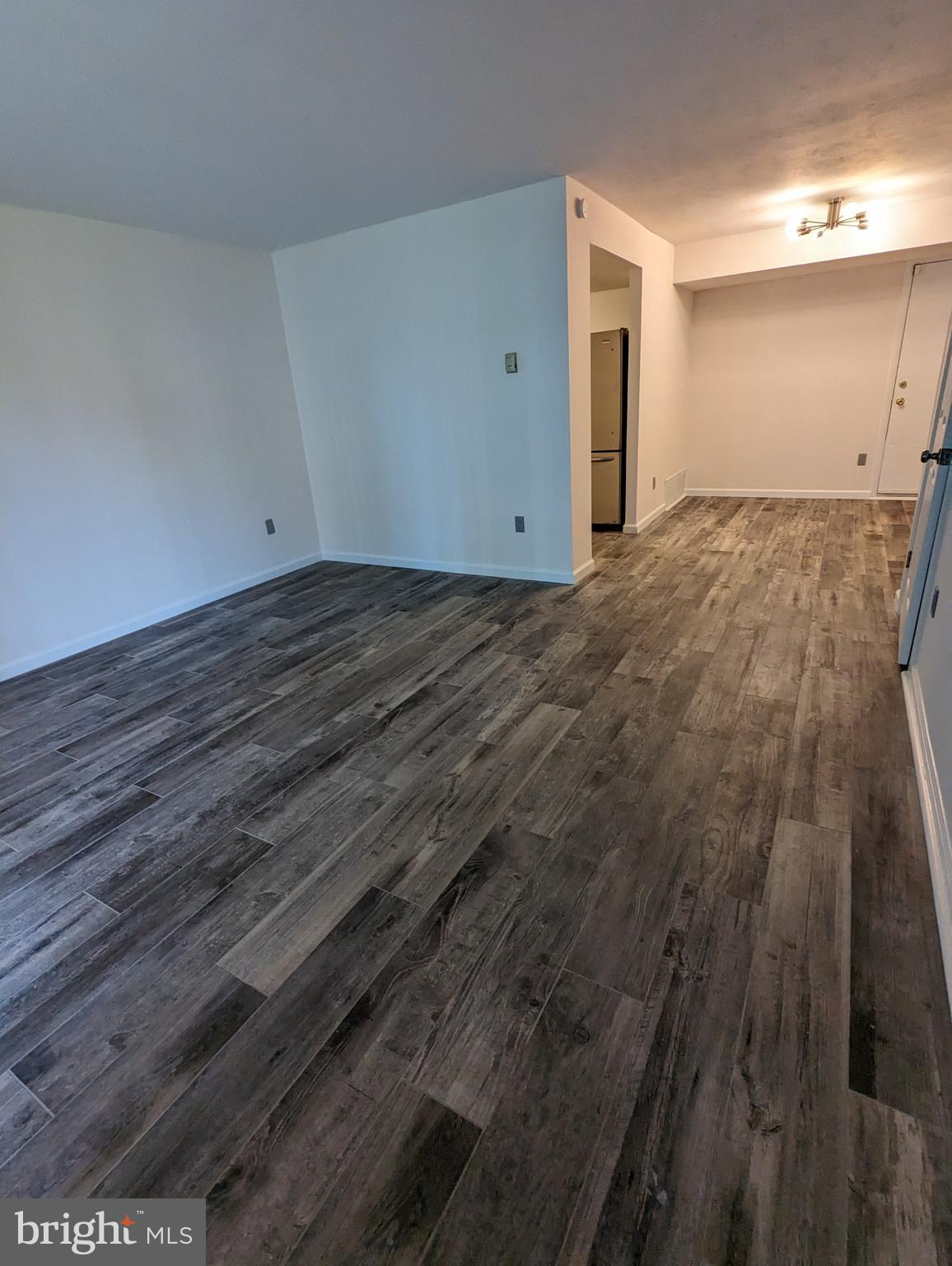 7252 Donnell Place, Unit A2 District Heights, MD 20747 - Photo 9 of 12 a view of empty room