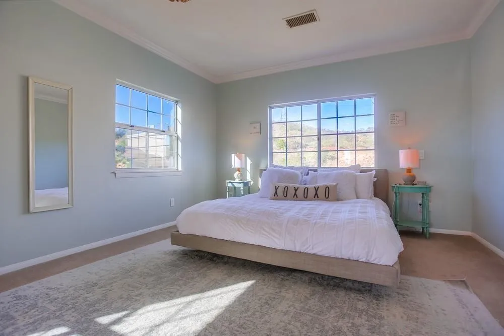 39221 Daily Road Fallbrook, CA 92028 - Photo 12 of 26 a bedroom with a bed and window