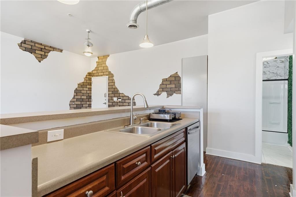 502 Pryor Street Southwest, Unit 328 Atlanta, GA 30312 - Photo 11 of 46 a view of utility room and wooden floor
