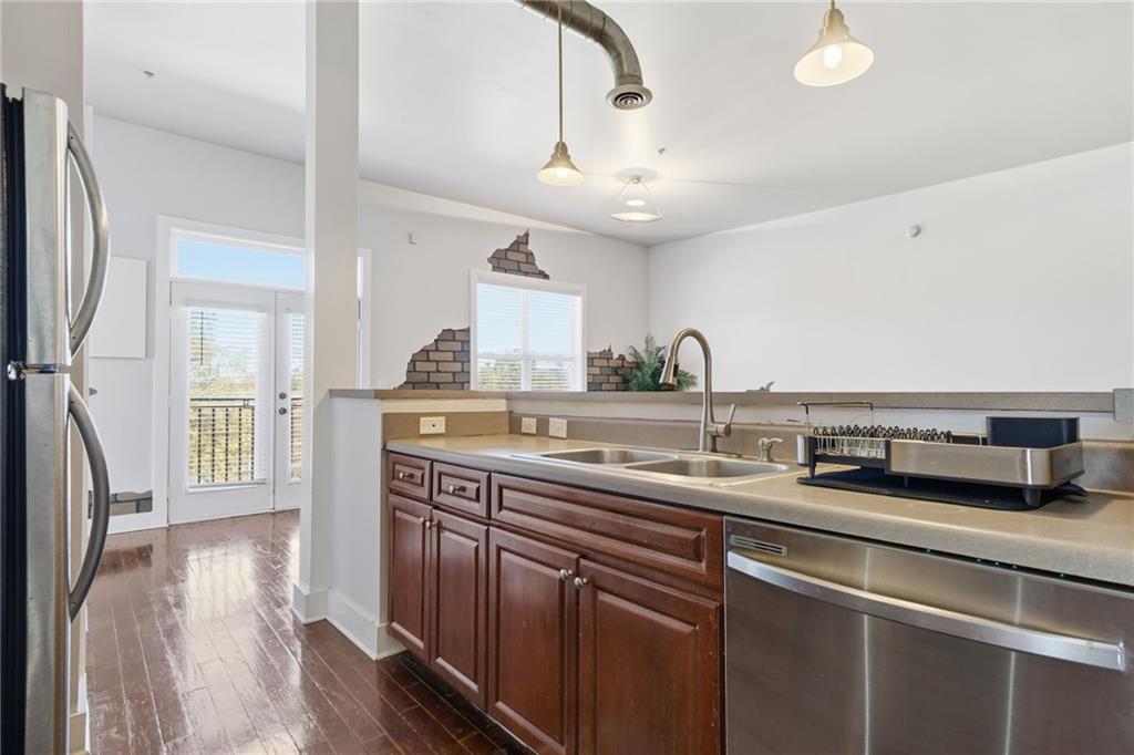 502 Pryor Street Southwest, Unit 328 Atlanta, GA 30312 - Photo 15 of 46 a kitchen with lots of counter space and a sink