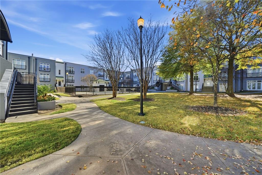 502 Pryor Street Southwest, Unit 328 Atlanta, GA 30312 - Photo 38 of 46 a view of yard with swimming pool and trees