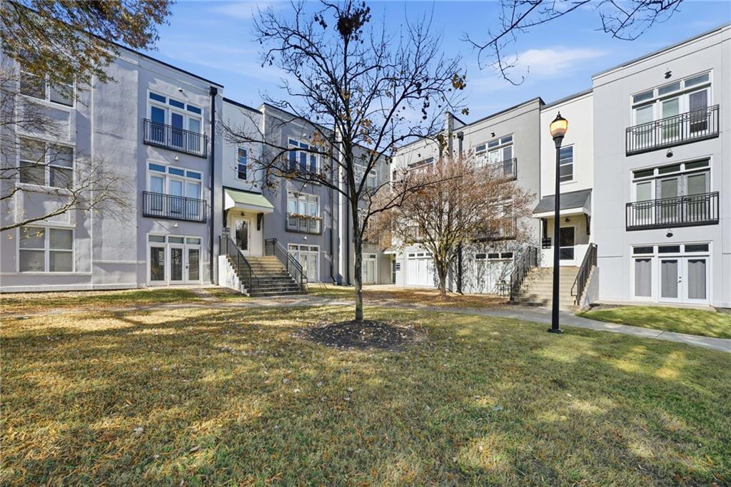 502 Pryor Street Southwest, Unit 328 Atlanta, GA 30312 - Photo 40 of 46 a house with swimming pool in front of it