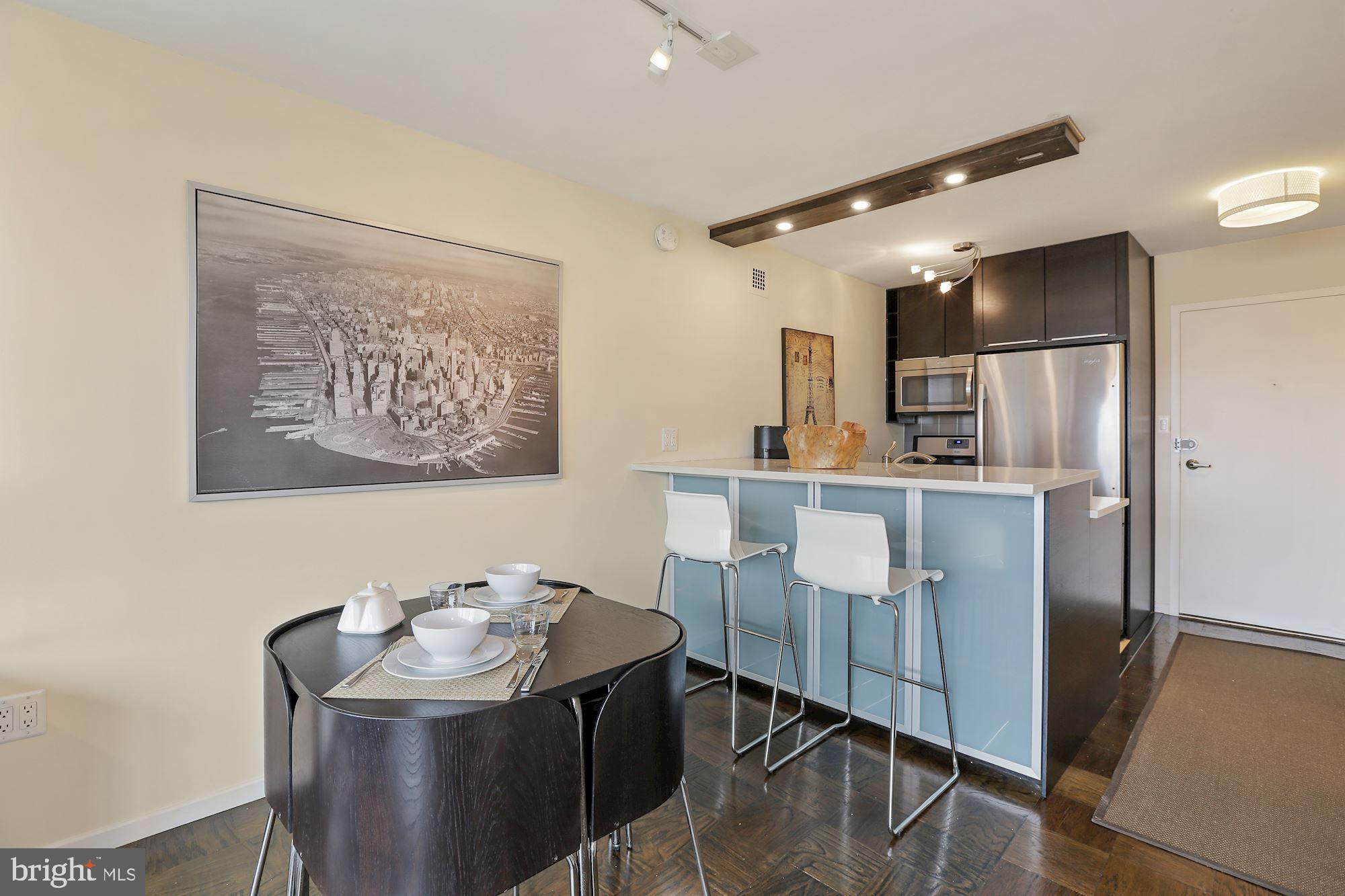 2030 F Street Northwest, Unit 606 Washington, DC 20006 - Photo 19 of 33 Living Area & Kitchen