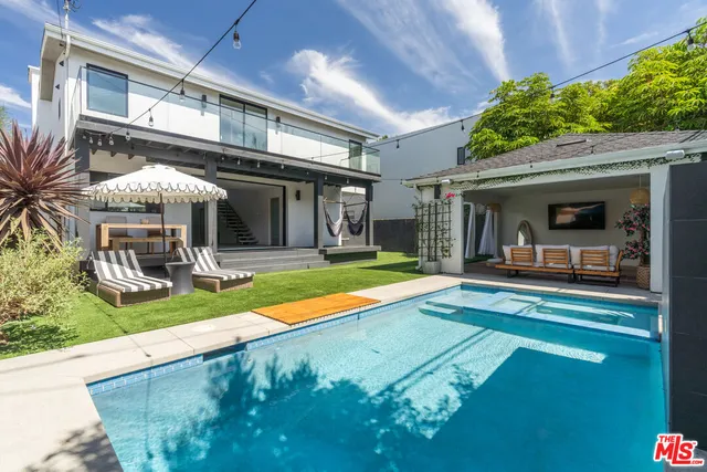 a view of a house with backyard porch and patio