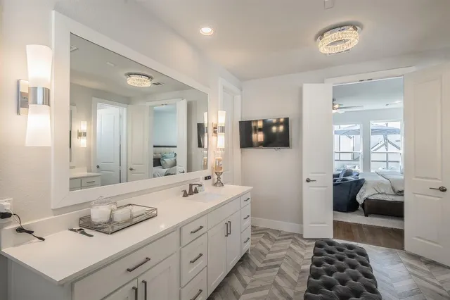 a spacious bathroom with a double vanity sink mirror and
