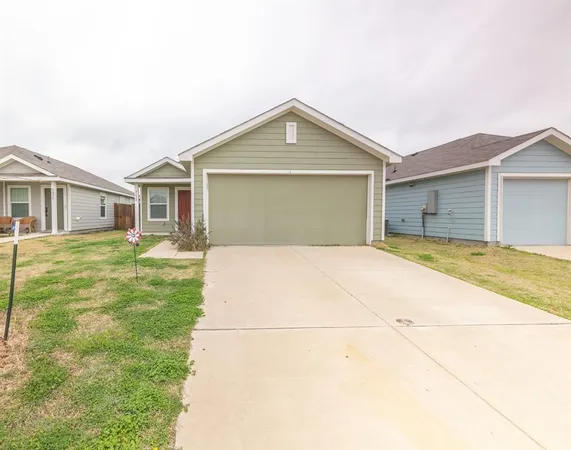 a big house with a big yard and large trees