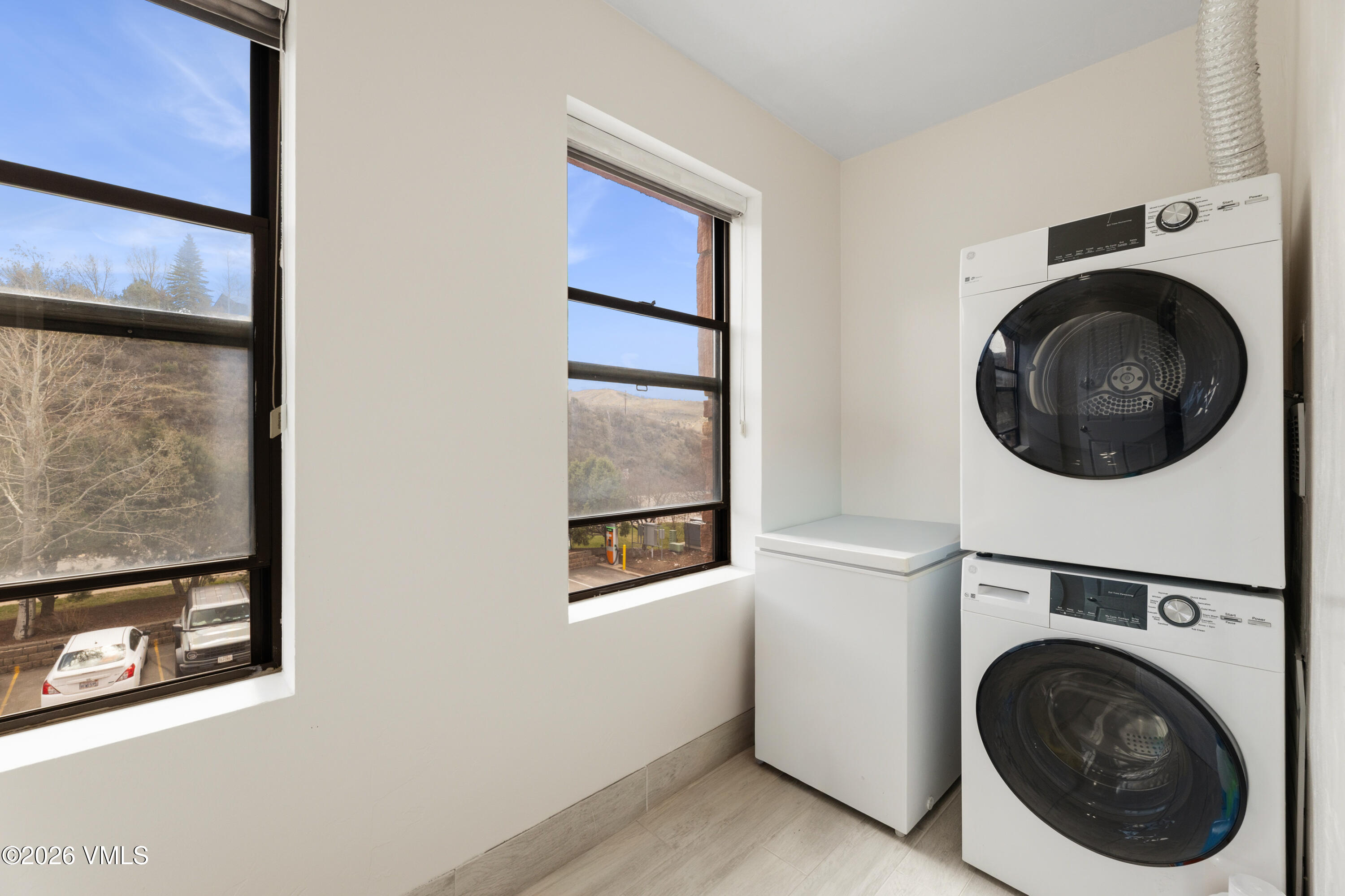 34295 Highway 6, Unit 213 Edwards, CO 81632 - Photo 29 of 47 Utility room W/ washer and dryer combo