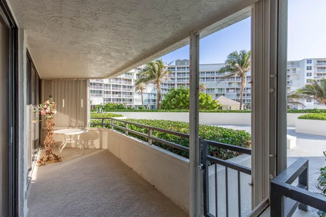 a view of a balcony with an outdoor space
