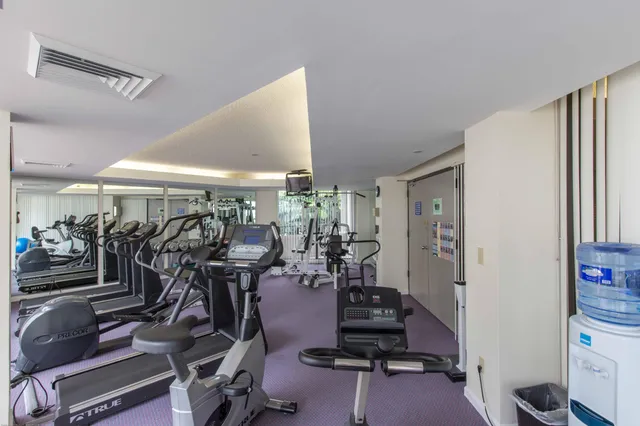 a view of a room with gym equipment