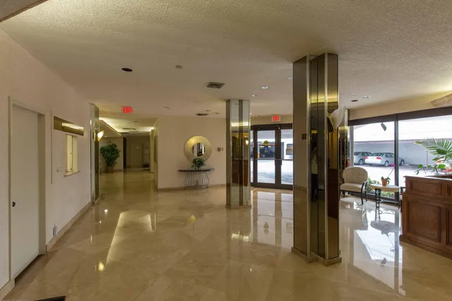 a view of a house and a garage