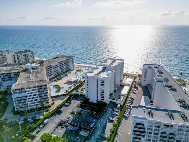 a view of a balcony with wooden floor