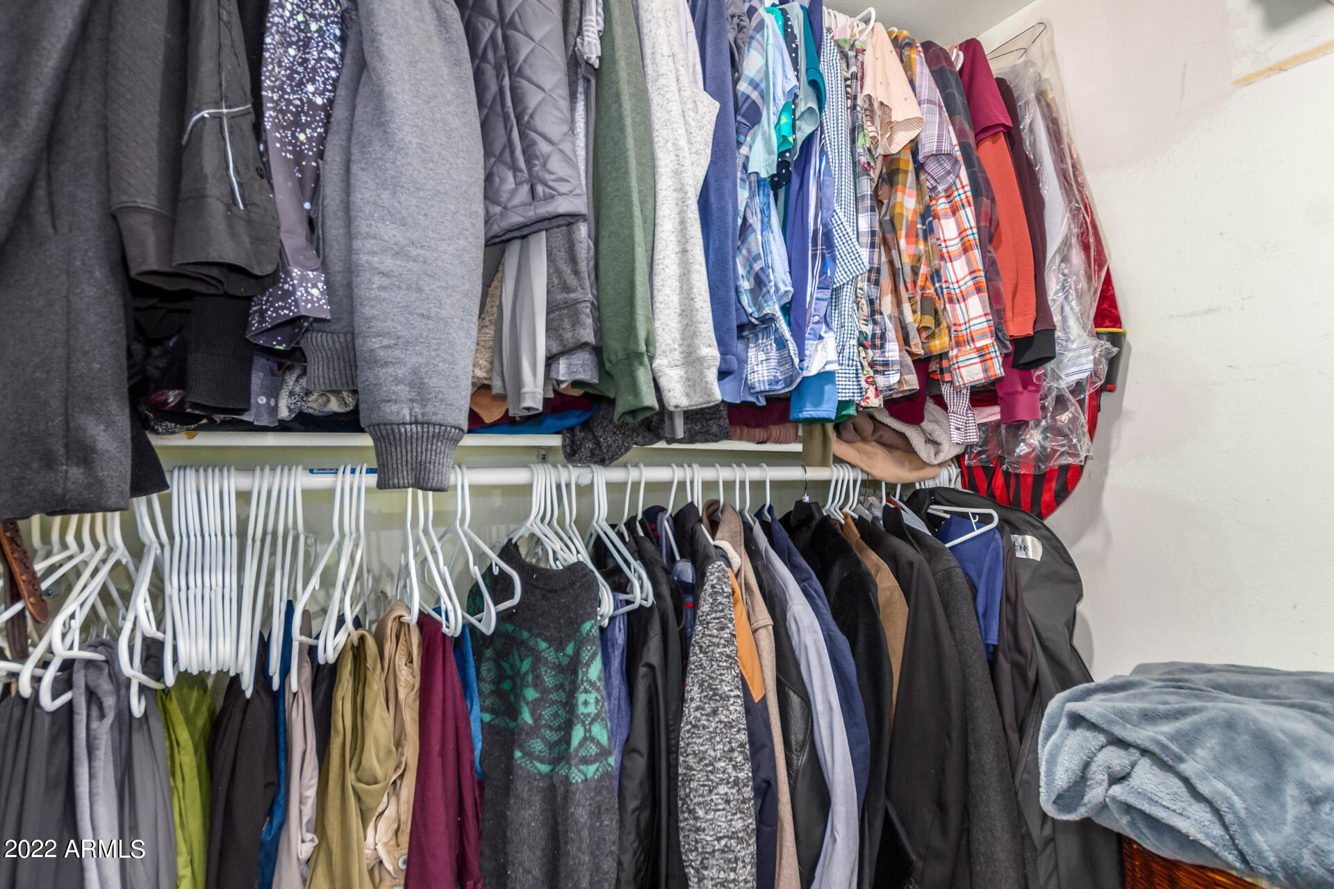 1217 North Miller Road, Unit 12 Scottsdale, AZ 85257 - Photo 15 of 25 Primary Suite Walk-in Closet