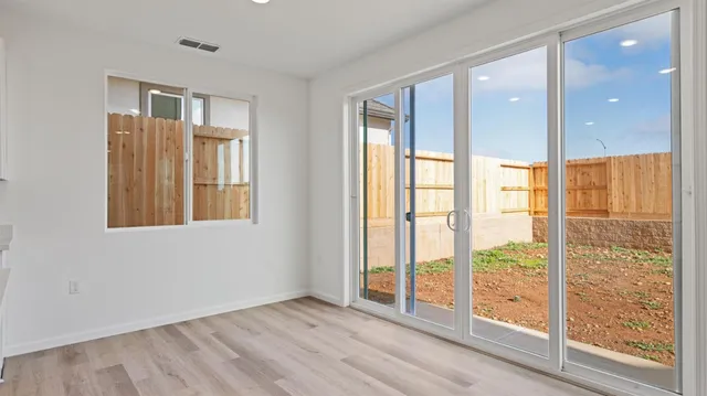 a view of an empty room and window