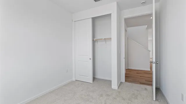 an empty room with closet