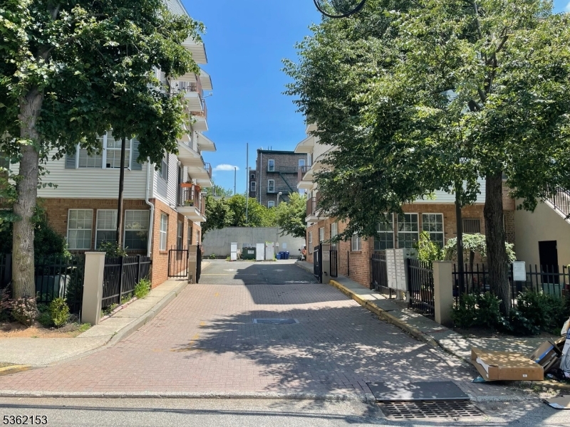 76 Union Street Newark, NJ 07105 - Photo 29 of 34 a view of a building with a tree