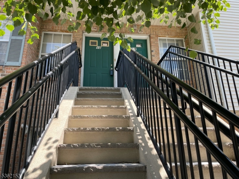 76 Union Street Newark, NJ 07105 - Photo 3 of 34 a view of entryway with wooden floor