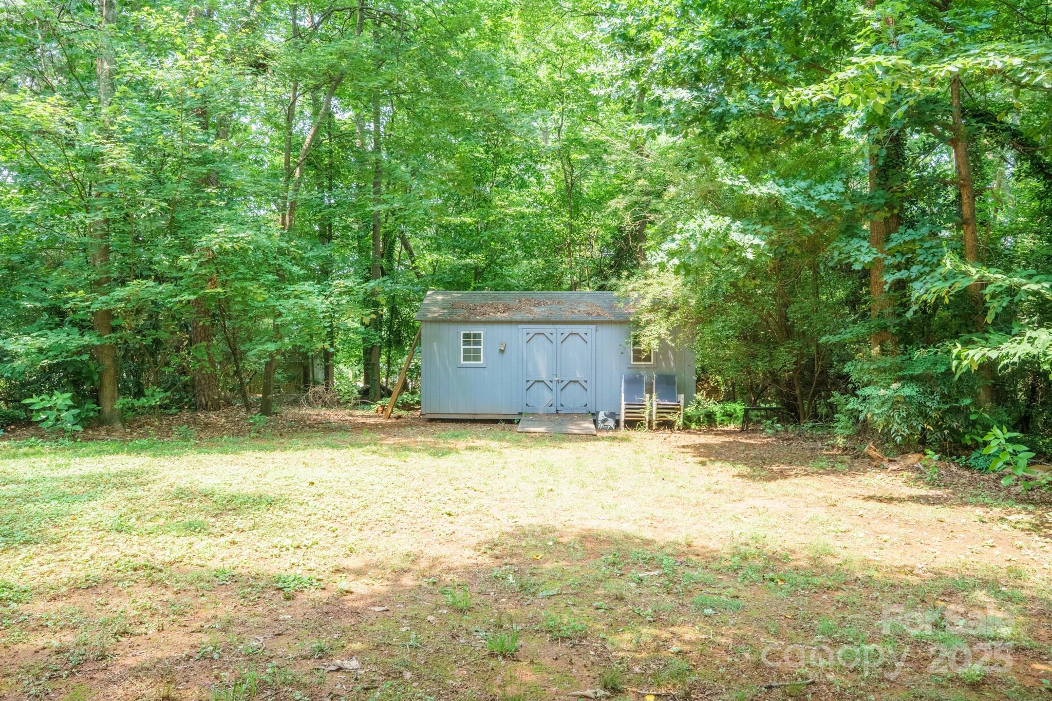 121 Jefferson Drive Locust, NC 28097 - Photo 22 of 22 a backyard of a house