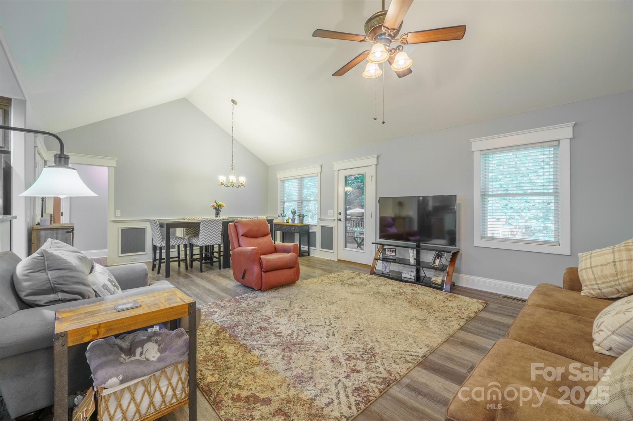 121 Jefferson Drive Locust, NC 28097 - Photo 4 of 22 a living room with furniture a window and a flat screen tv