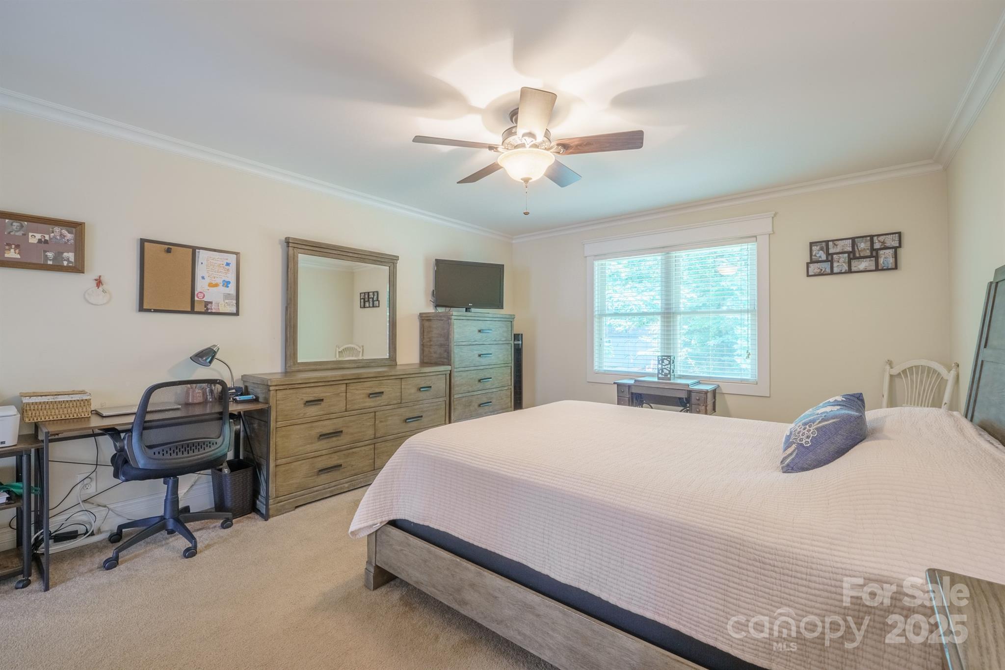 121 Jefferson Drive Locust, NC 28097 - Photo 10 of 22 a bedroom with a bed a computer on a desk and chair