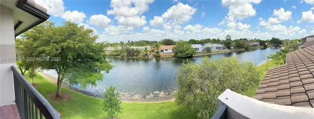 a view of a lake from a balcony