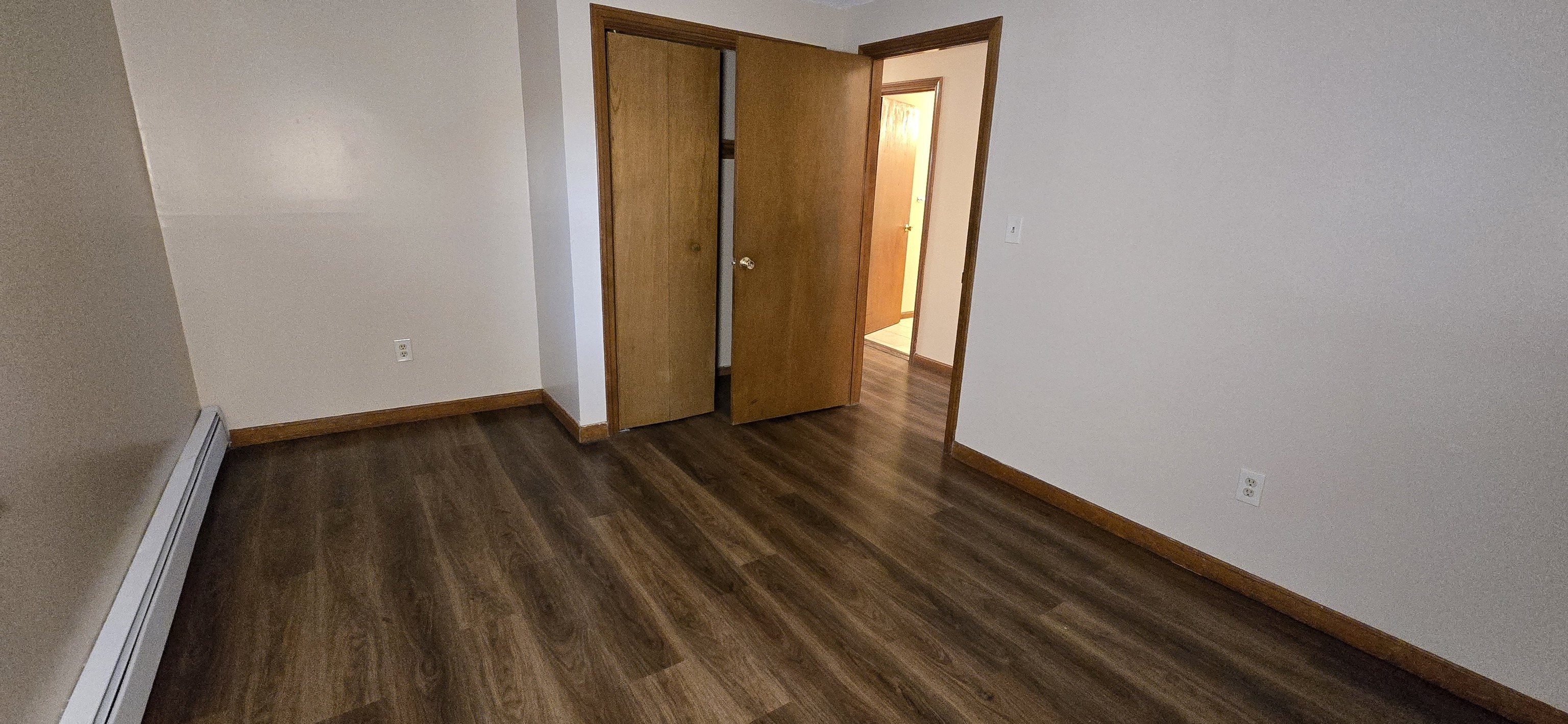 2319 Main Street Hartford, CT 06120 - Photo 6 of 9 a view of a room with wooden floor and door