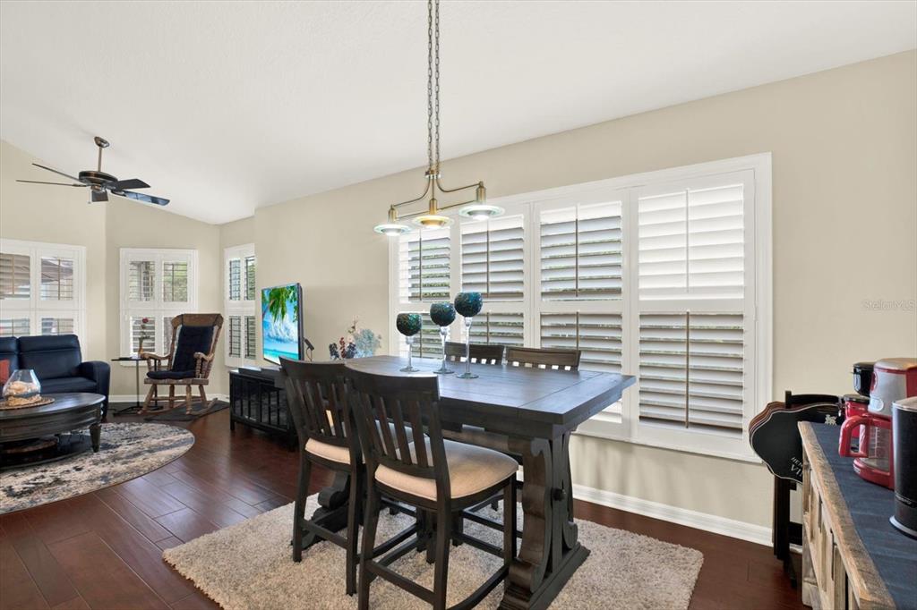2021 Meadow Rue Court Trinity, FL 34655 - Photo 6 of 41 a view of a dining room with furniture and window