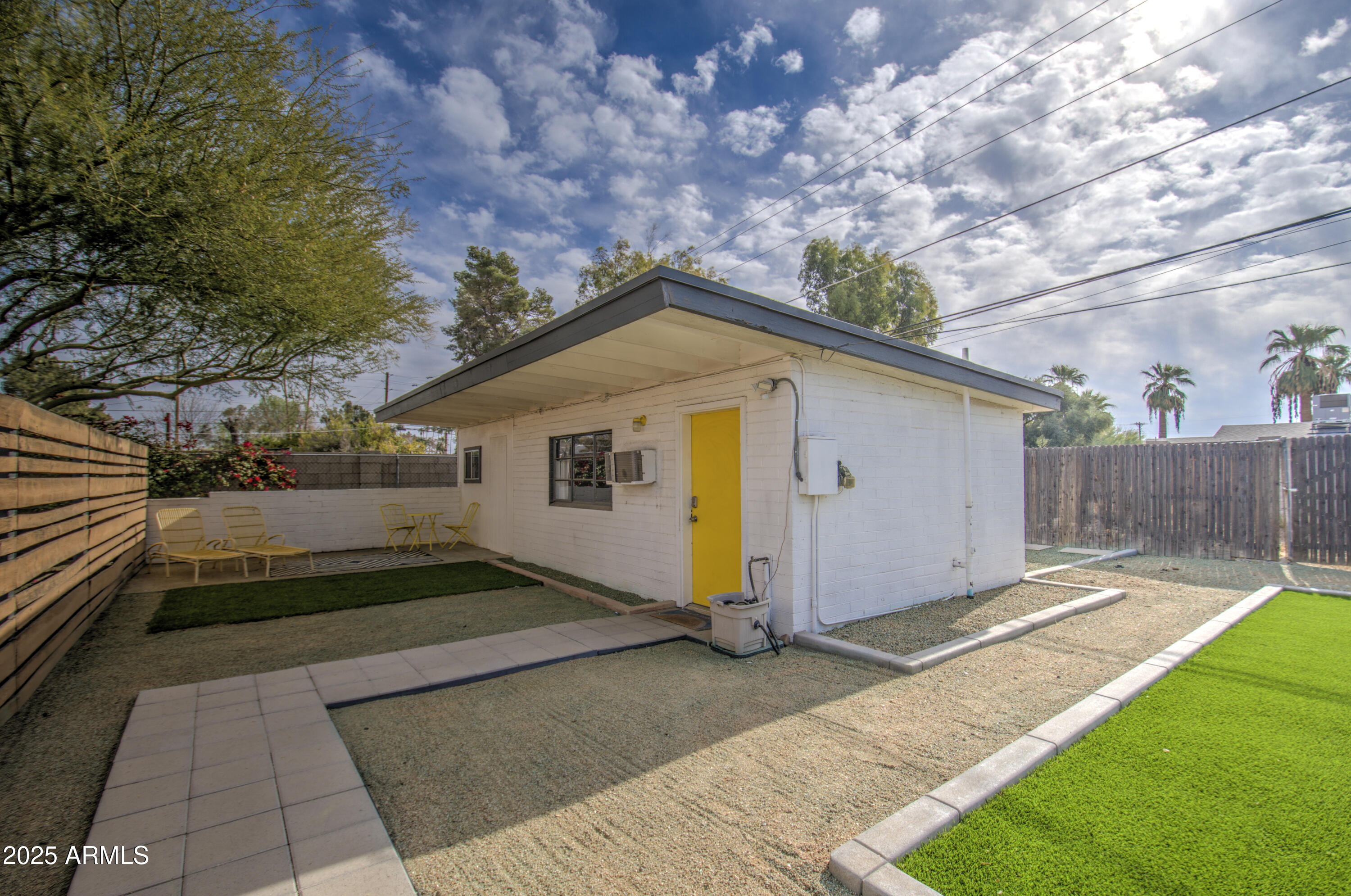 2937 East Osborn Road Phoenix, AZ 85016 - Photo 28 of 59 a front view of house with yard and trees in the background