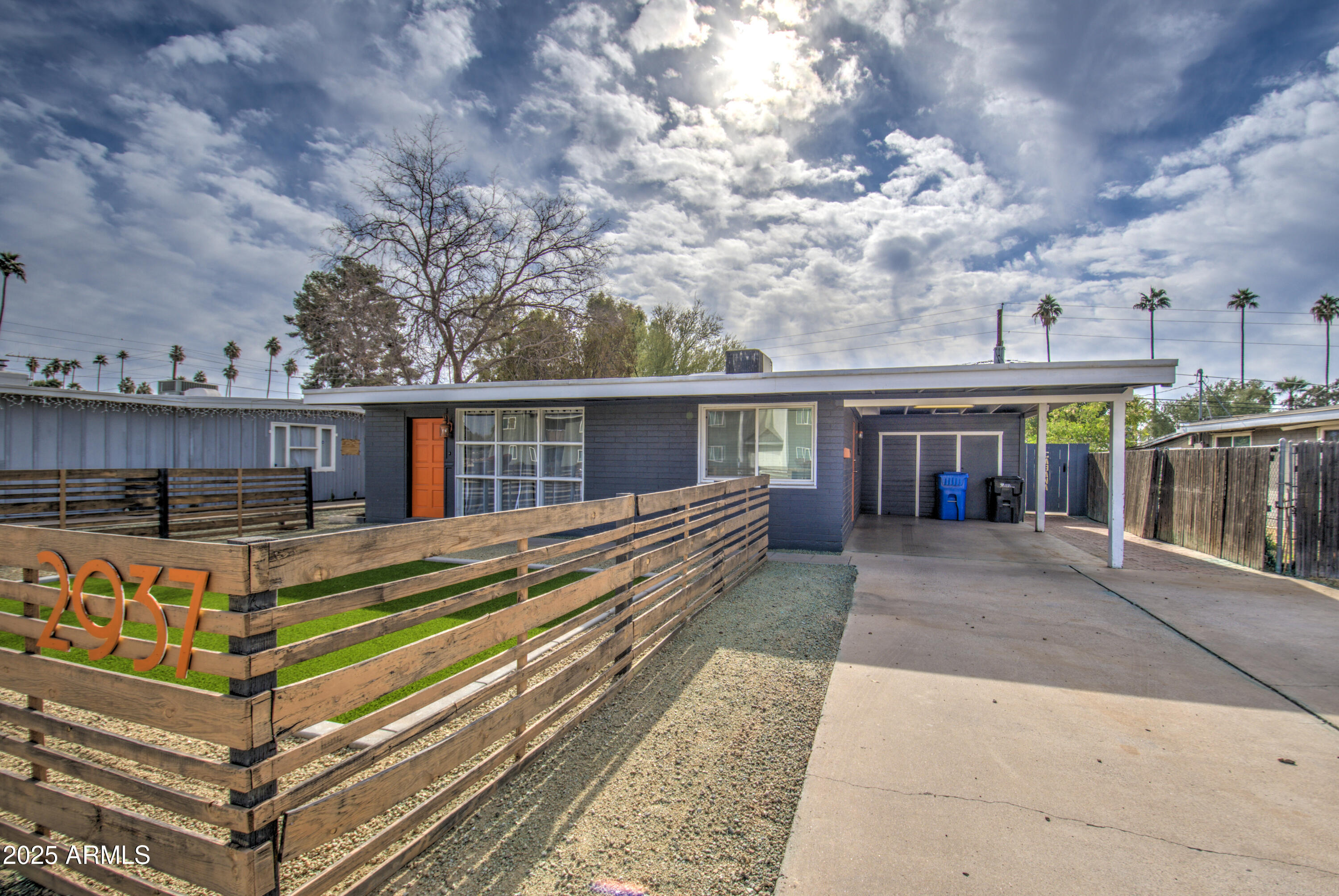 2937 East Osborn Road Phoenix, AZ 85016 - Photo 3 of 59 a view of a house with pool and a yard
