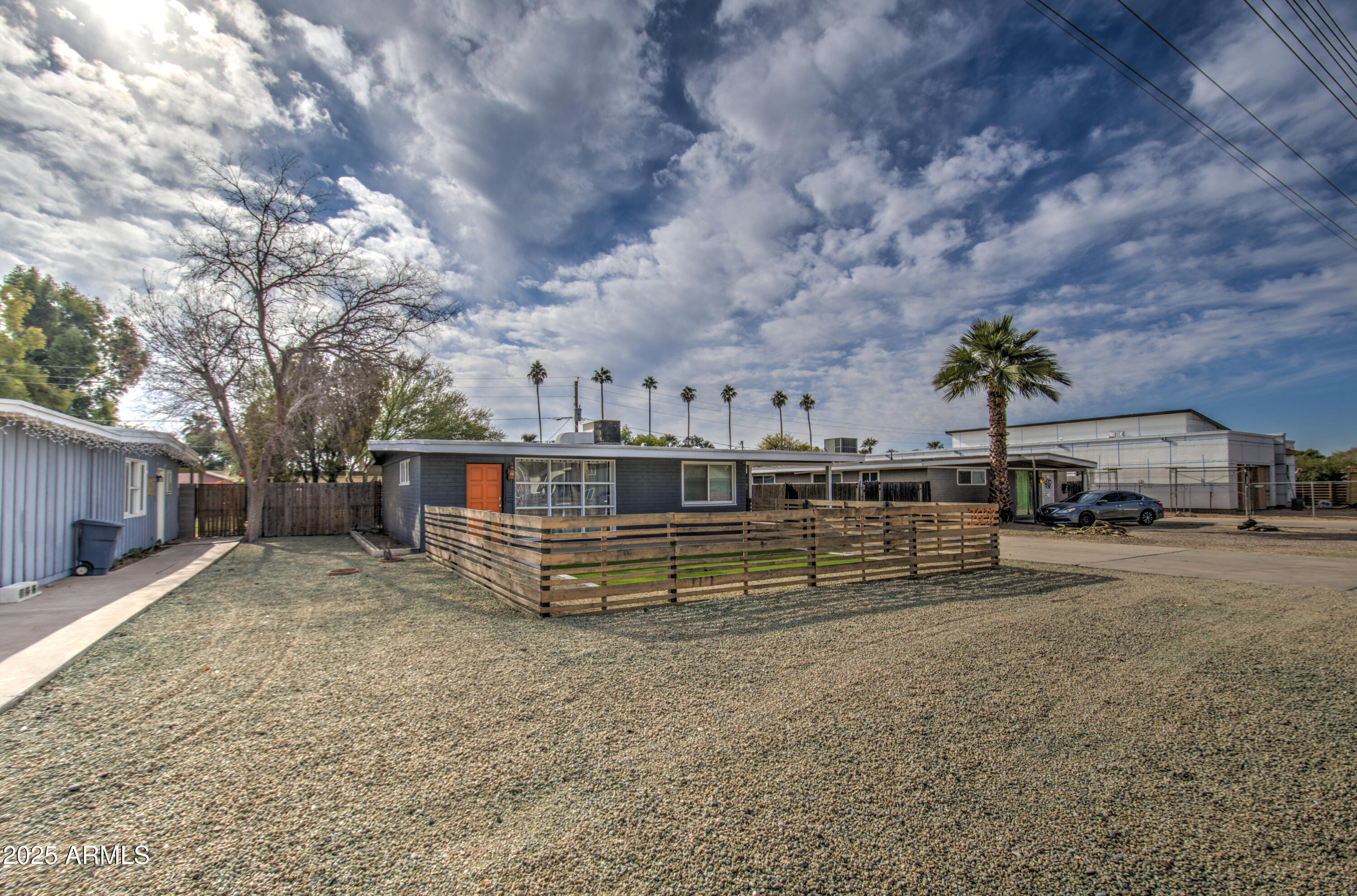 2937 East Osborn Road Phoenix, AZ 85016 - Photo 59 of 59 a view of a house with a yard and sitting area