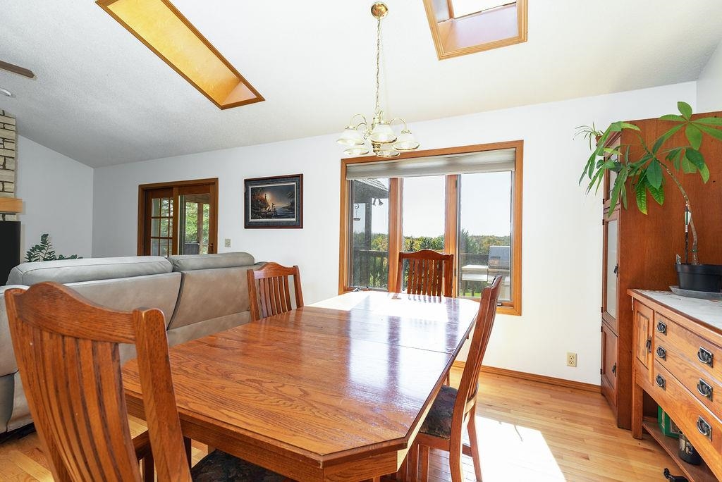405 West Wachter Road Galena, IL 61036 - Photo 21 of 57 a view of a dining room with furniture window and wooden floor