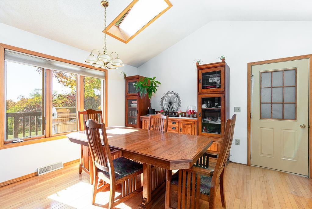 405 West Wachter Road Galena, IL 61036 - Photo 22 of 57 a view of a dining room with furniture window and wooden floor