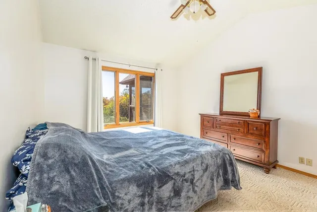 a white bath tub sitting next to a window
