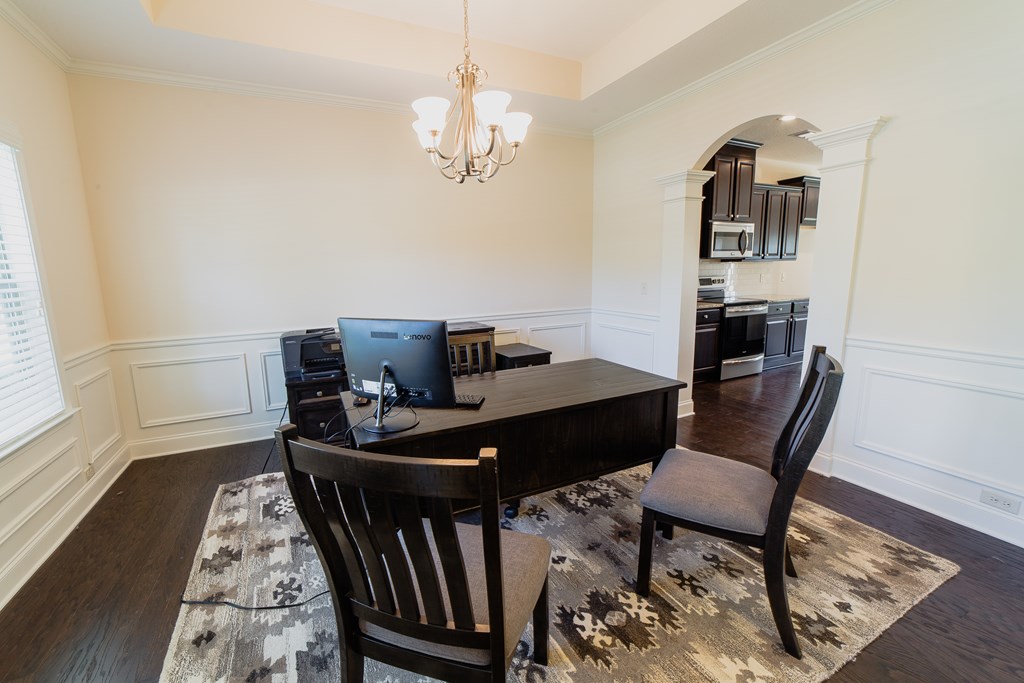 7536 Garrett Road Midland, GA 31820 - Photo 5 of 33 a view of a dining room with furniture and wooden floor