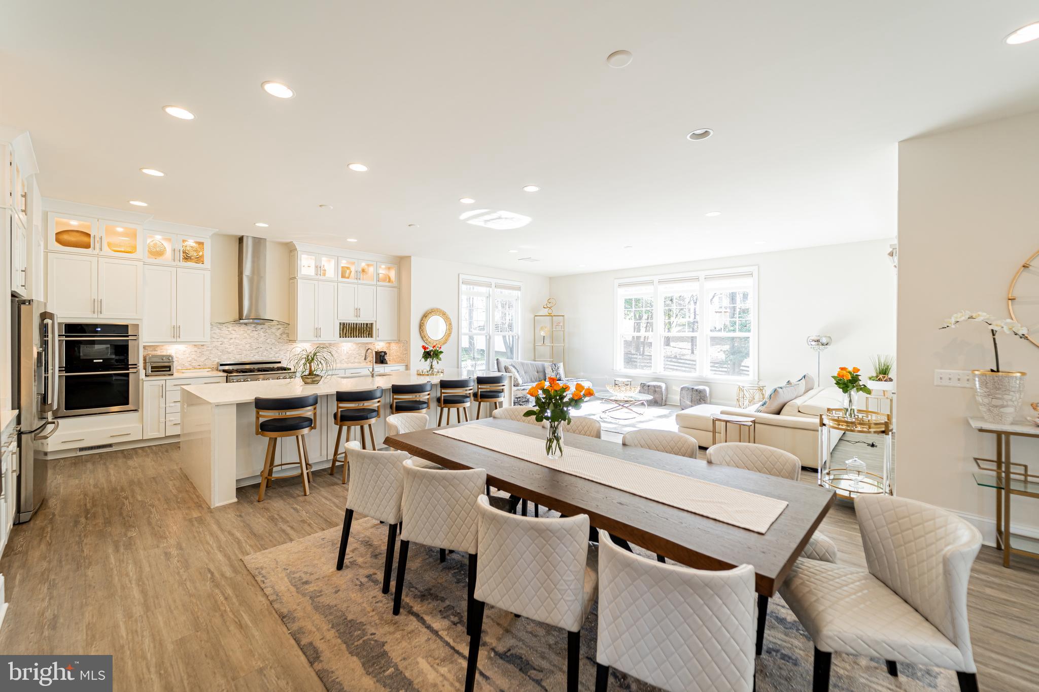 1059 Marmion Drive Herndon, VA 20170 - Photo 21 of 92 a view of a dining room with furniture and wooden floor
