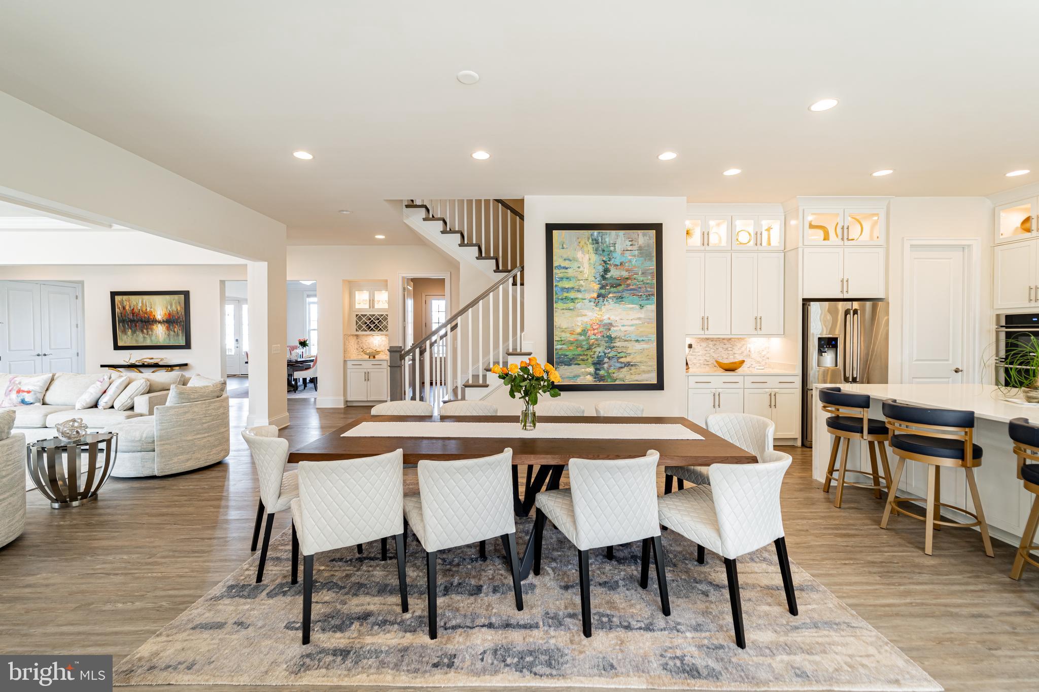 1059 Marmion Drive Herndon, VA 20170 - Photo 25 of 92 a dining hall with stainless steel appliances kitchen island a table and chairs